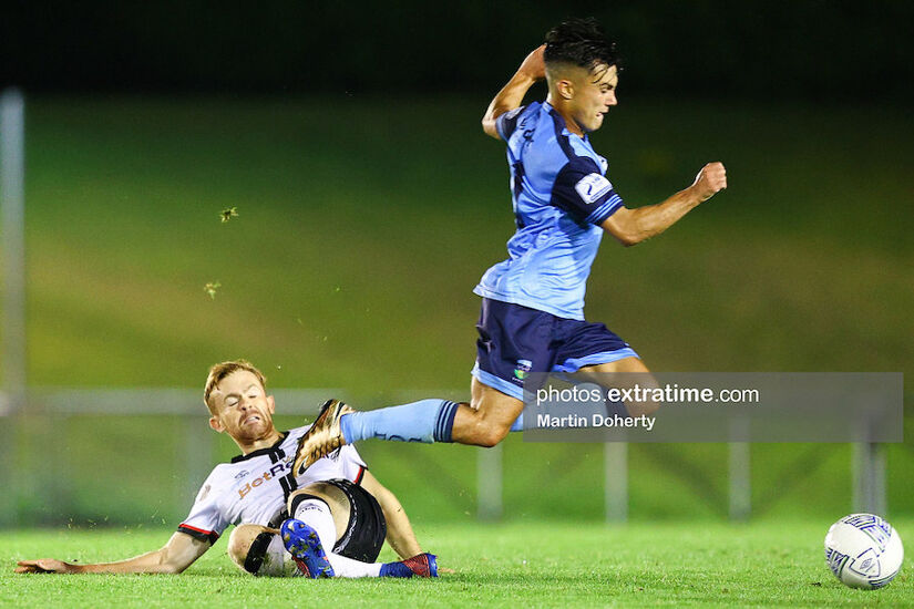 Sean Brennan of UCD tackled by Paul Doyle