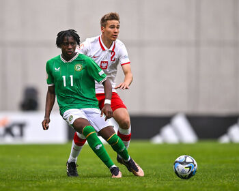 Ikechukwu Orazi of Republic of Ireland in action against Dominik Szala of Poland during the UEFA European Under-17 Championship Finals 2023 Group A match between Poland and Republic of Ireland in Budapest in May