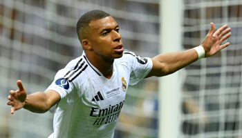 Kylian Mbappe of Real Madrid celebrates scoring his team's second goal during the UEFA Super Cup 2024 match between Real Madrid and Atalanta BC at National Stadium on August 14, 2024 in Warsaw, Poland.