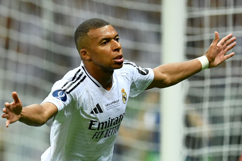 Kylian Mbappe of Real Madrid celebrates scoring his team's second goal during the UEFA Super Cup 2024 match between Real Madrid and Atalanta BC at National Stadium on August 14, 2024 in Warsaw, Poland.