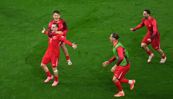 Muhammed Kerem Akturkoglu of Turkiye celebrates scoring his team's third goal with teammates during the UEFA EURO 2024 group stage match between Turkiye and Georgia