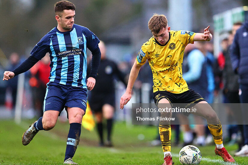 Alex Nolan (right) in action for St Pat's against St Mochta's in the Leinster Senior Cup