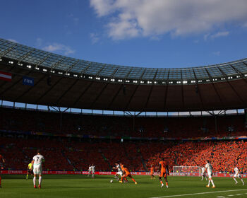 General view inside the stadium as Florian Grillitsch of Austria is challenged by Donyell Malen of the Netherlands during the UEFA EURO 2024 group stage match between Netherlands and Austria at Olympiastadion on June 25, 2024 in Berlin