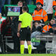 Referee Rade Obrenovic reviewing penalty incident in UEFA Nations League game between the Republic of Ireland and Armenia
