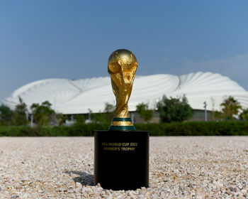 World Cup Trophy in front of Al Janoub Stadium in Qatar