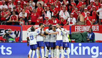 Kylian Mbappe of France celebrates with teammates after Maximilian Woeber of Austria (not pictured) concedes an own goal after deflecting a cross during the UEFA EURO 2024 group stage match between Austria and France at Düsseldorf Arena