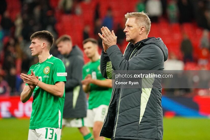 Heimir Hallgrímsson and Andrew Moran clap the Ireland fans after the 5-0 defeat to England at Wembley on 17 November 2024