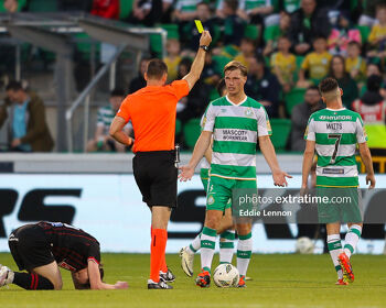 Australian Premier League referee Jarred Gillett gives Shamrock Rovers defender Dan Cleary a yellow card in the Hoops 2-1 Champions League first round qualifier second leg win over Vikingur in July 2024