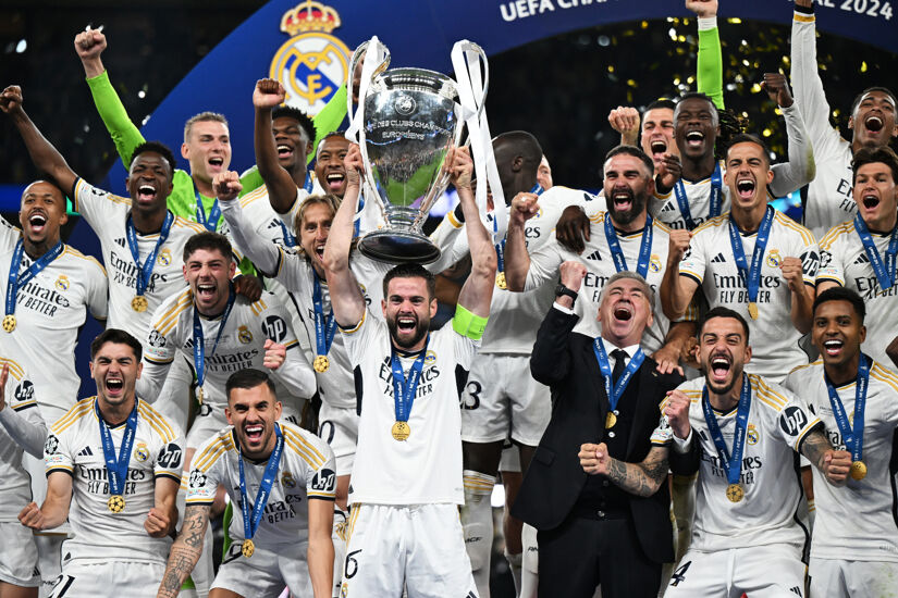 Nacho Fernandez of Real Madrid lifts the UEFA Champions League Trophy after his team's victory after the UEFA Champions League 2023/24 Final match between Borussia Dortmund and Real Madrid CF at Wembley Stadium