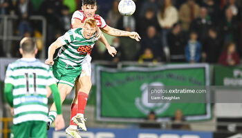 Joe Redmond and Rory Gaffney challenge for the ball in Tallaght