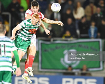 Joe Redmond and Rory Gaffney challenge for the ball in Tallaght