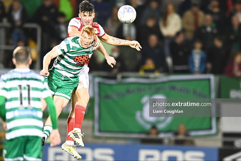 Joe Redmond and Rory Gaffney challenge for the ball in Tallaght