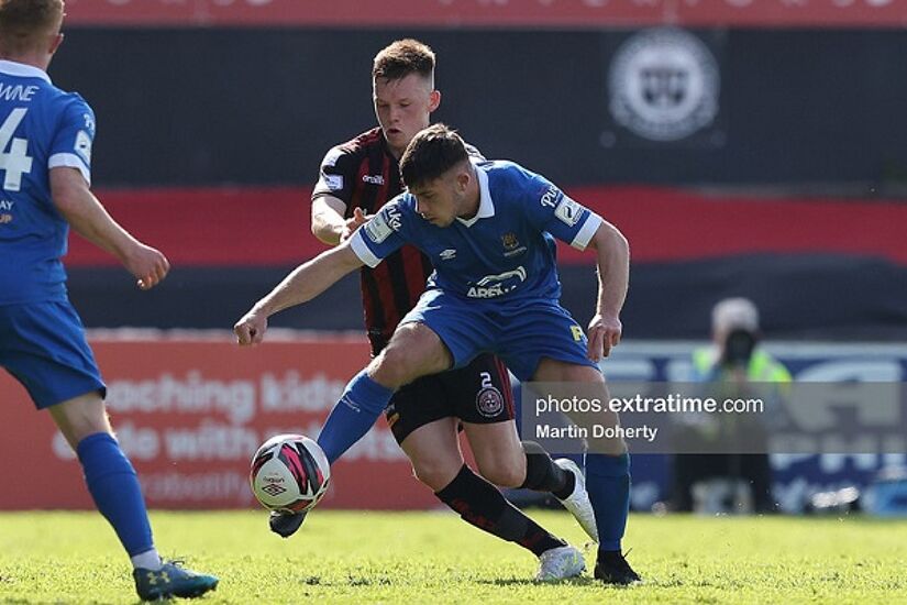 Adam O'Reilly of Waterford FC tackled by Andy Lyons of Bohemian FC during the SSE Airtricity League Premier Division match between Bohemian Fc and Waterford FC at Dalymount Park Dublin