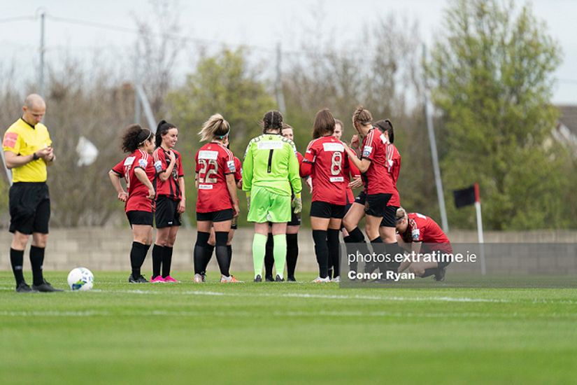 Bohemians players huddle together before their 6-2 win over Treaty United on Saturday, March 27 2021.