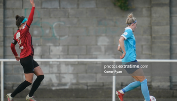 Sophie Watters Bohemian FC raises her arm to claim a throw in as Shauna Fox, Shelbourne FC sees the ball over the side line.
