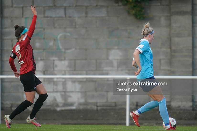 Sophie Watters Bohemian FC raises her arm to claim a throw in as Shauna Fox, Shelbourne FC sees the ball over the side line.