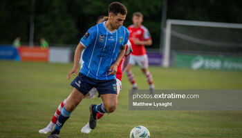 Evan Osam in action for UCD