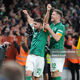 Robbie Brady celebrates with Nathan Collins after scoring the winning goal