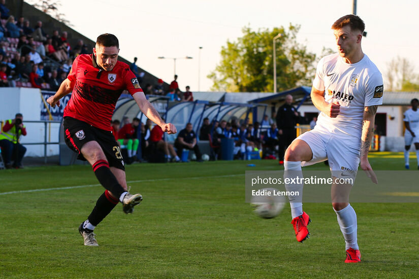 Longford Town's Conor Crowley and Athlone Town defender Dylan Hand (right)