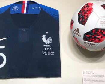 Samuel Umtiti's jersey from the last World Cup and the kick-off ball from the final his team won in Russia