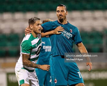 Zlatan Ibrahimović battles with Shamrock Rovers' Lee Grace during Milan's 2-0 Europa League qualifier win in Tallaght in 2020.