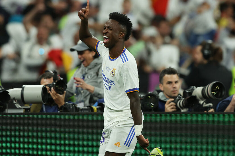 Vinicius Junior of Real Madrid celebrates after scoring their team's first goal during the UEFA Champions League final match between Liverpool FC and Real Madrid at Stade de France on May 28, 2022 in Paris, France.