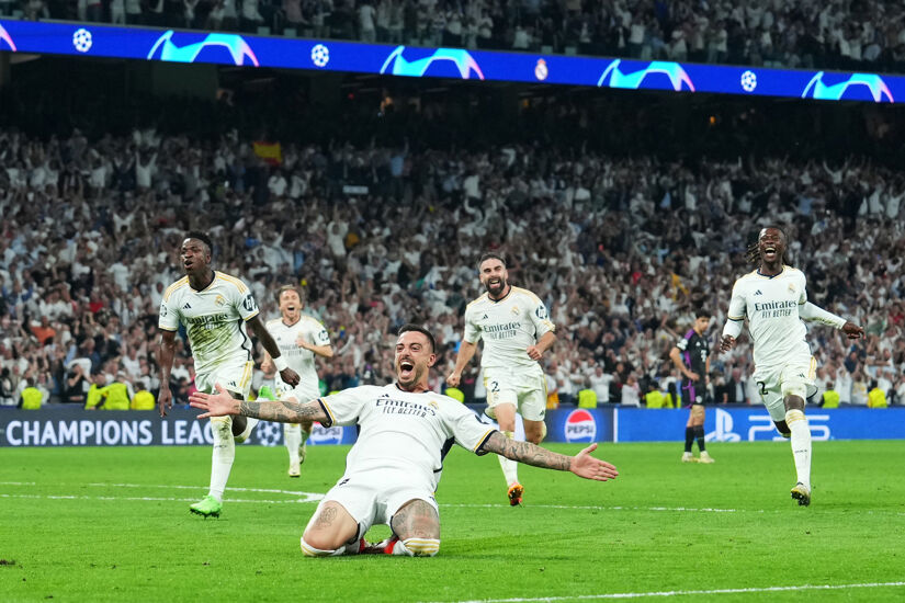 Joselu of Real Madrid celebrates scoring his team's second goal during the UEFA Champions League semi-final second leg match between Real Madrid and Bayern Munich at Estadio Santiago Bernabeu on May 08, 2024 in Madrid, Spain