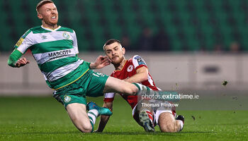 Darragh Nugent of Shamrock Rovers is fouled by Aaron Bolger of St. Patrick's Athletic during the 2024 Men's President of Ireland's Cup match between Shamrock Rovers and St. Patrick's Athletic at Tallaght Stadium on 09 February 2024.