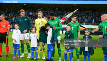 Andrew Omobamidele gives us warm up top to ball kid ahead of kick-off at a cold Aviva Stadium on Tuesday night