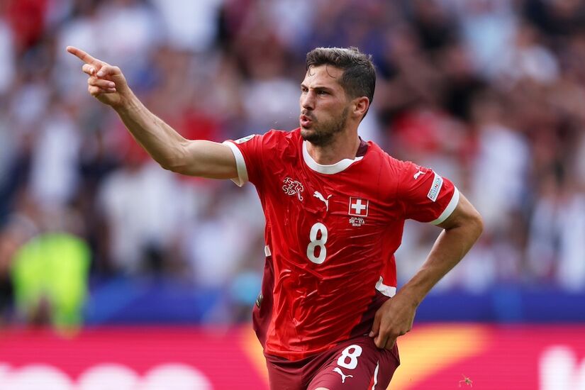 Remo Freuler of Switzerland celebrates scoring his team's first goal during the UEFA EURO 2024 round of 16 match between Switzerland and Italy at Olympiastadion on June 29, 2024 in Berlin