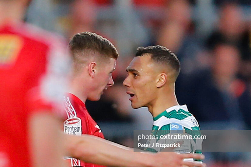 Graham Burke of Shamrock Rovers exchanges words with Kameron Ledwidge during Rovers' 2-0 win over Shels last May