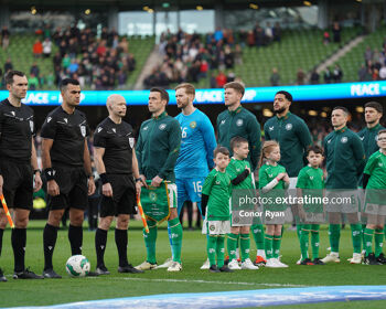 The Republic of Ireland team face the flag for the anthem ahead of their game against Belgium at the Aviva Stadium on Saturday, 23 March 2024.