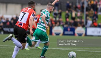 Jack Byrne points the way ahead of Derry City's Michael Duffy in the game in the Brandywell in May 2023 - Byrne scored both goals in the 2-0 win