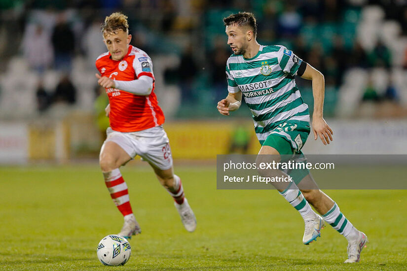 Neil Farrugia takes on Sam Curtis (left)