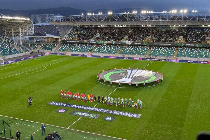 Larne and Shamrock Rovers line up before kick-off at Windsor Park