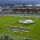 Larne and Shamrock Rovers line up before kick-off at Windsor Park