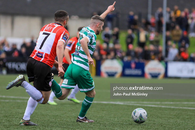 Jack Byrne on the ball with Michael Duffy in close attendance