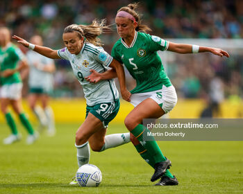 Caitlin Hayes challenging Northern Ireland's Simone Magill for the ball