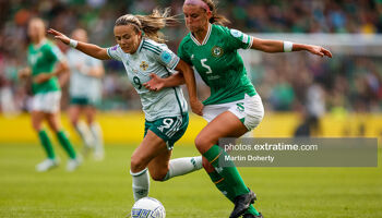 Caitlin Hayes challenging Northern Ireland's Simone Magill for the ball