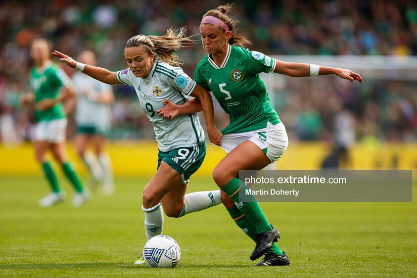 Caitlin Hayes challenging Northern Ireland's Simone Magill for the ball