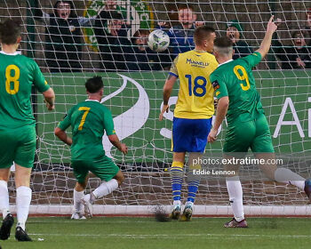 On the mark, Ryan Kelliher, number 9, for Kerry FC