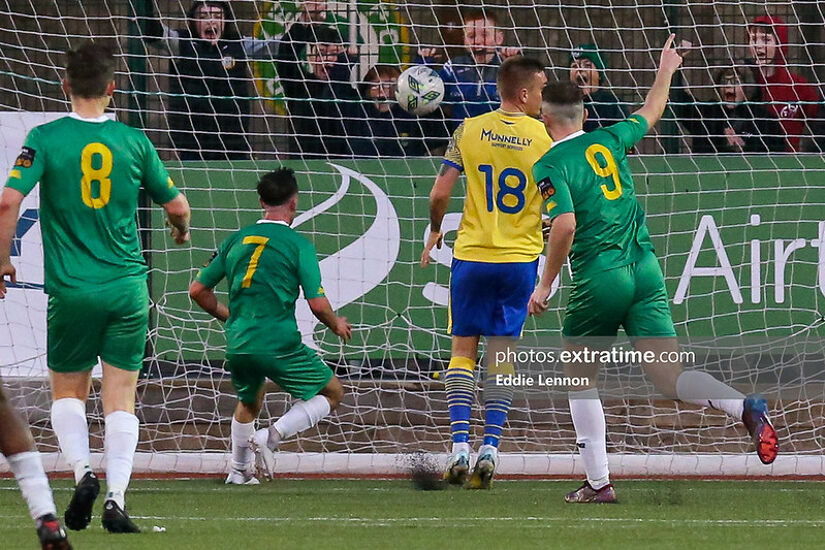 On the mark, Ryan Kelliher, number 9, for Kerry FC