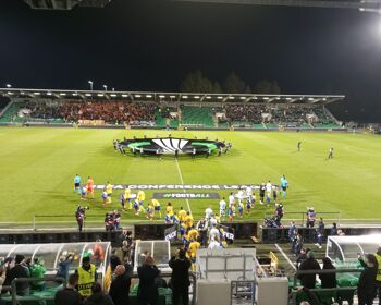 Shamrock Rovers and APOEL players take the field ahead of their UEFA Conference League opener in Tallaght.