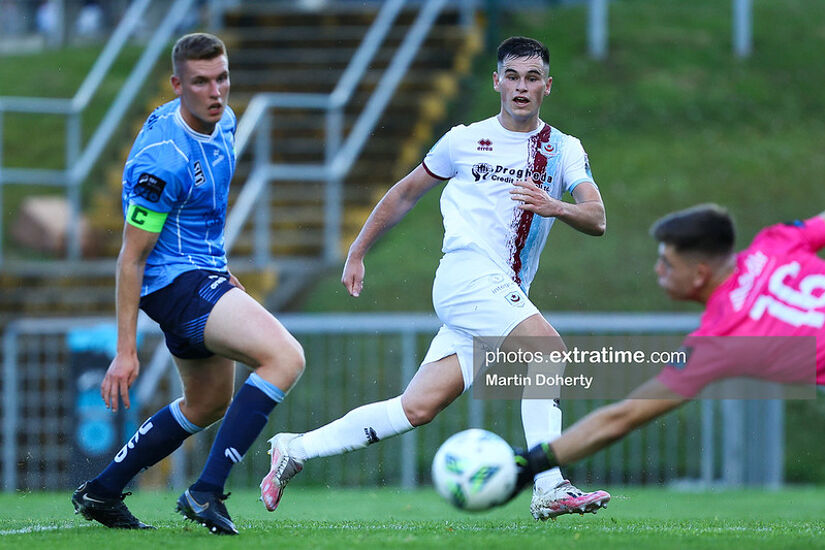 Evan Weir of Drogheda United shooting towards goal away to UCD