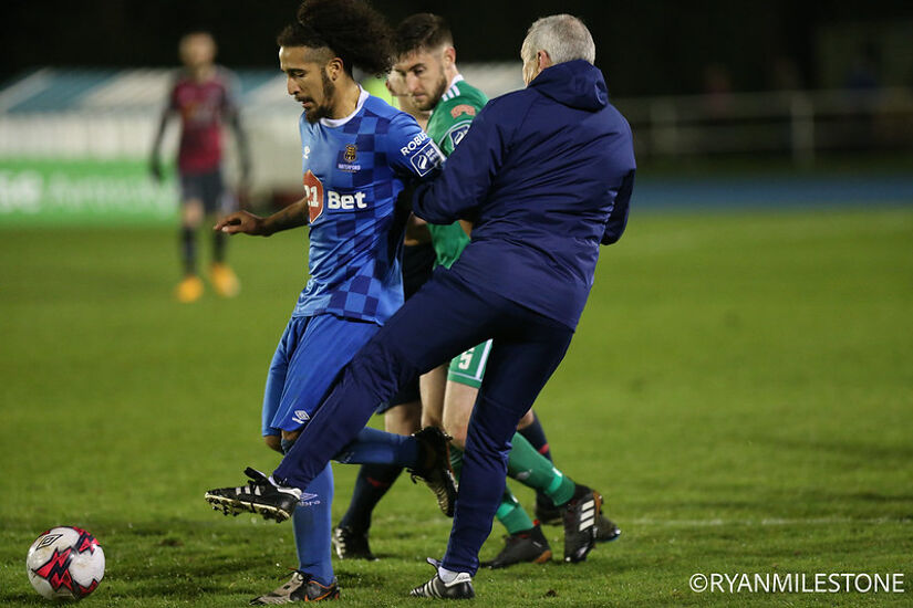 Waterford's Bastien Héry clashes with Cork City boss John Caulfield during the SSE Airtricity League Premier Division game between Waterford FC and Cork City in April 2018