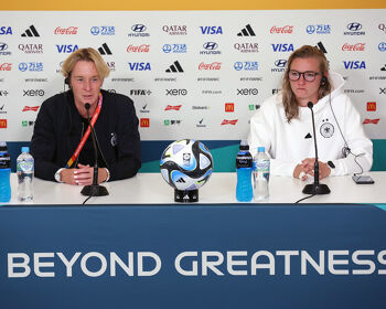 Martina Voss-Tecklenburg, Head Coach of Germany, and Alexandra Popp of Germany speak to the media in the post match press conference