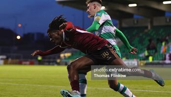 Al-Amin Kazeem of Galway United is challenged by Darragh Burns during a 2024 clash at Tallaght Stadium.