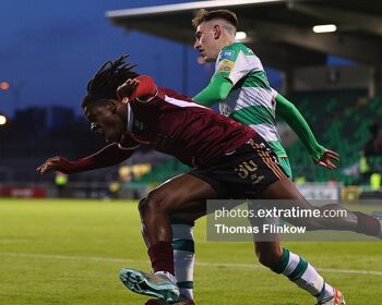 Al-Amin Kazeem of Galway United is challenged by Darragh Burns during a 2024 clash at Tallaght Stadium.