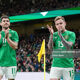 Robbie Brady and Sammie Szmodics of Republic of Ireland applaud the crowd as they leave the field of play after been substituted during an international friendly match between ROI v Switzerland.