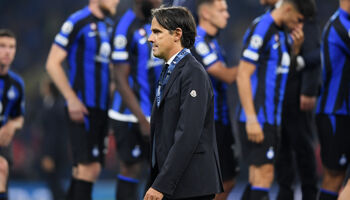 Simone Inzaghi, Head Coach of Internazionale, looks dejected with their runners up medal after the team's defeat during UEFA Champions League final match between Inter and Manchester City